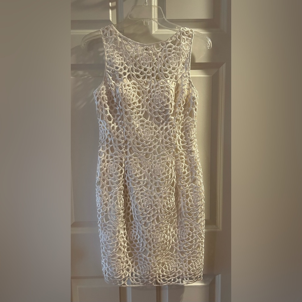 NIGHTLINE WHITE EYELET LACE DRESS. Form fitting hits at knee. Lined. Size 4. $90